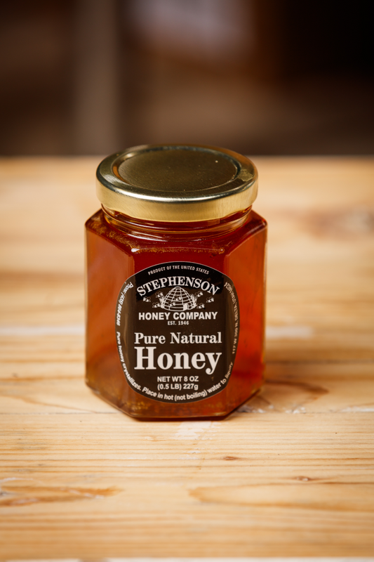 pure natural honey glass hexagon jar Delta Utah